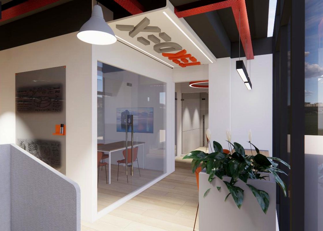 Glass meeting room off the main corridor